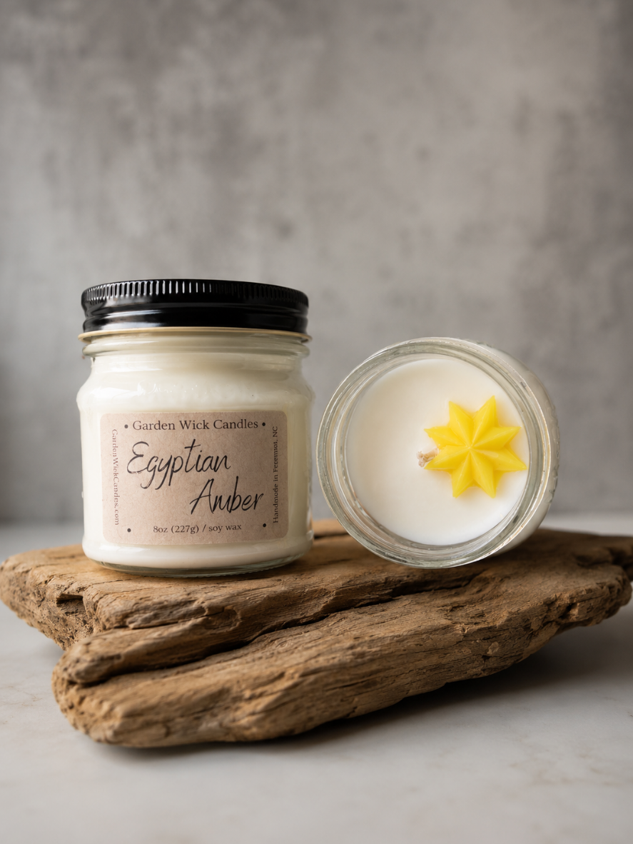 Egyptian Amber mason jar candle with woody and musky fragrance featuring notes of jasmine, sandalwood, tonka bean, and amber from Garden Wick