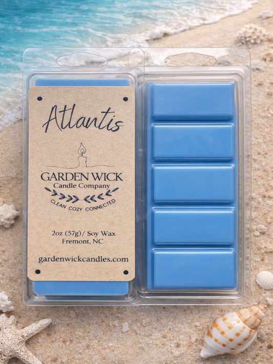 Atlantis hand-poured wax melt with fresh oceanic scent including petitgrain, ozone, sea salt, plum, eucalyptus, powder, sandalwood, and dark musk from Garden Wick