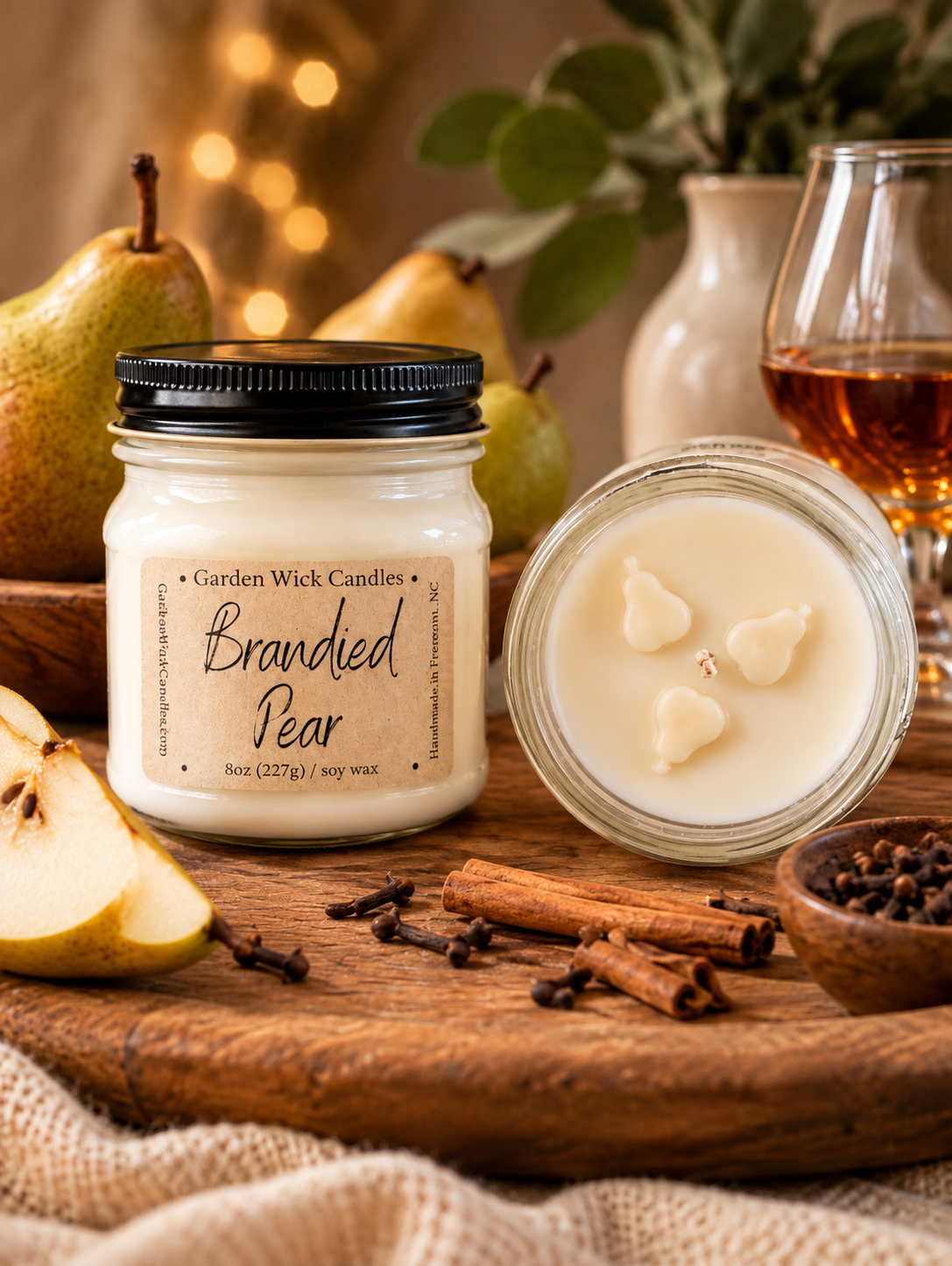 Hand-poured Brandy Pear soy candle by Garden Wick featuring the sweet aroma of juicy pear, apple, warm spices, and aged brandy.
