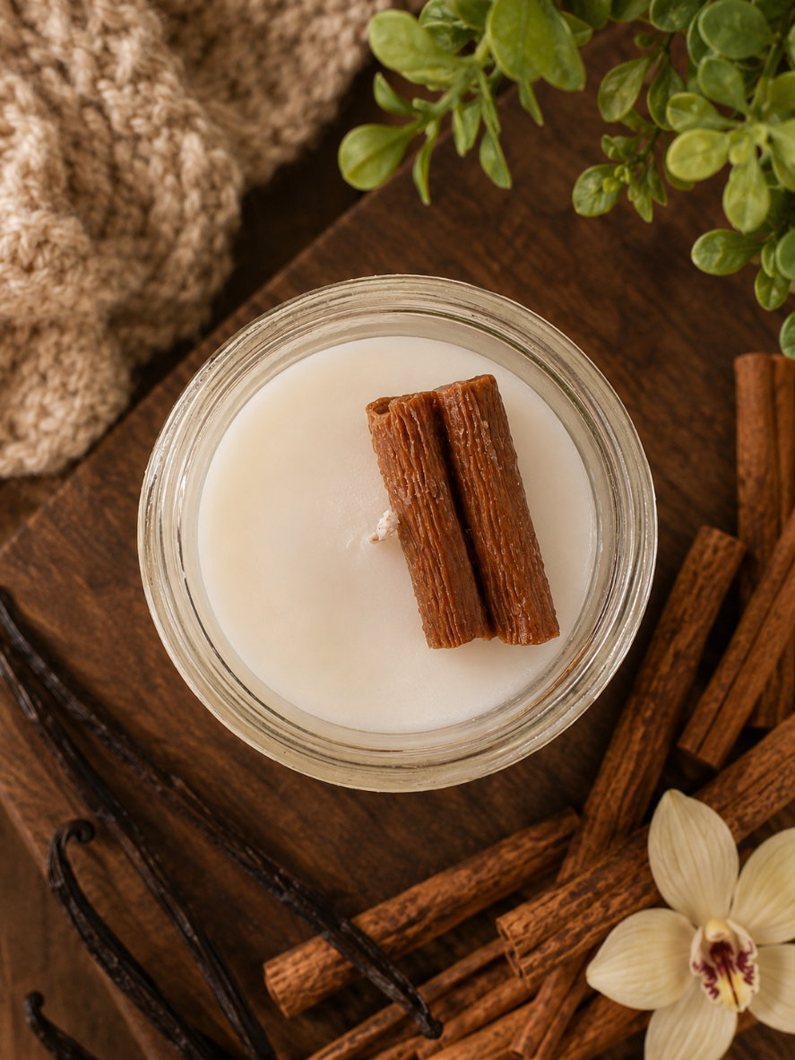 Handcrafted Cinnamon Vanilla soy candle by Garden Wick featuring warm notes of clove, cinnamon, cream, and vanilla in an 8 oz mason jar, creating a cozy fall and holiday home fragrance.
