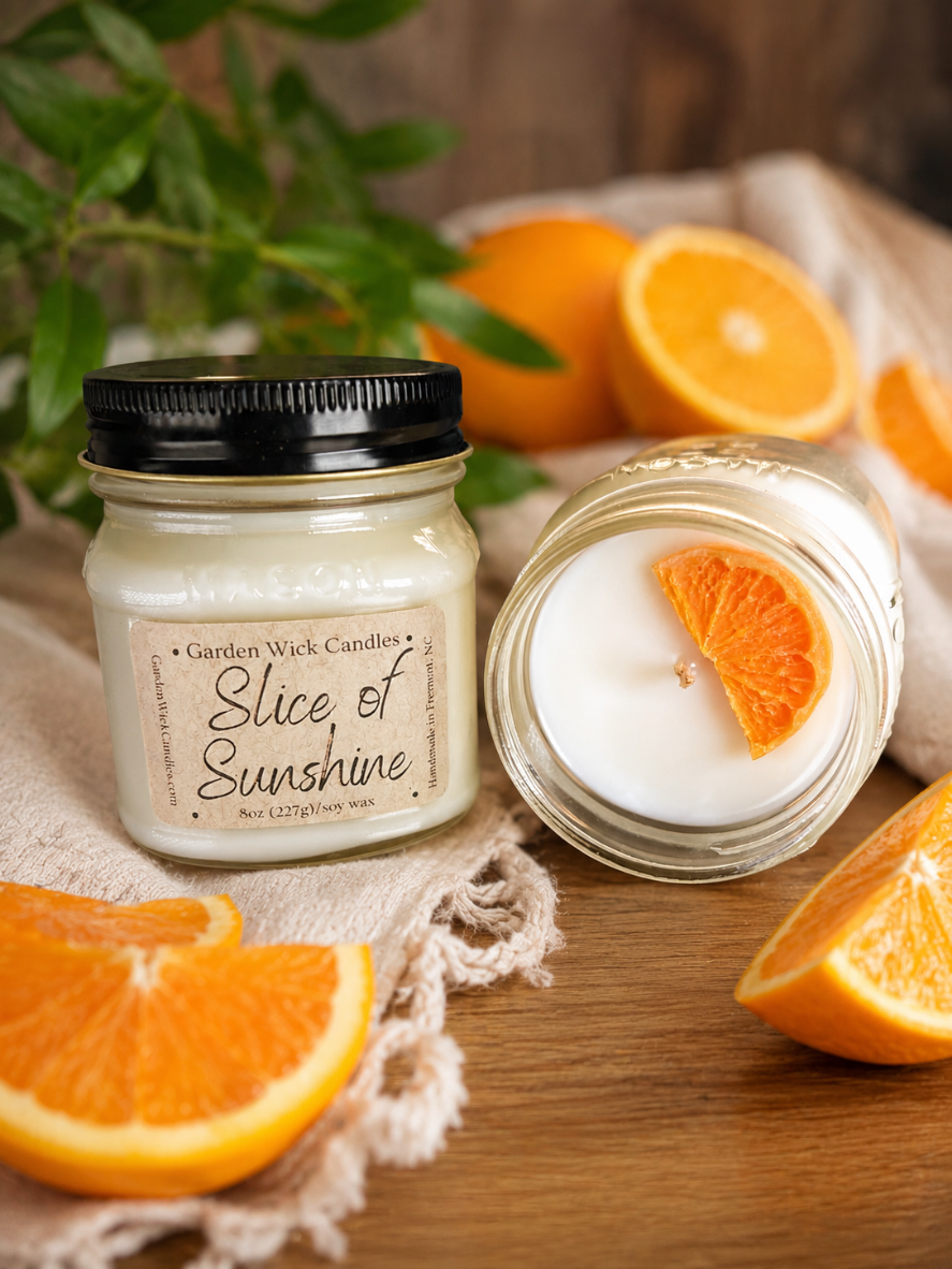 Slice of Sunshine citrus candle featuring an orange slice wax embed, scented with grapefruit, mandarin, orange, fresh lemon, and citrus peels for a bright, uplifting fragrance.