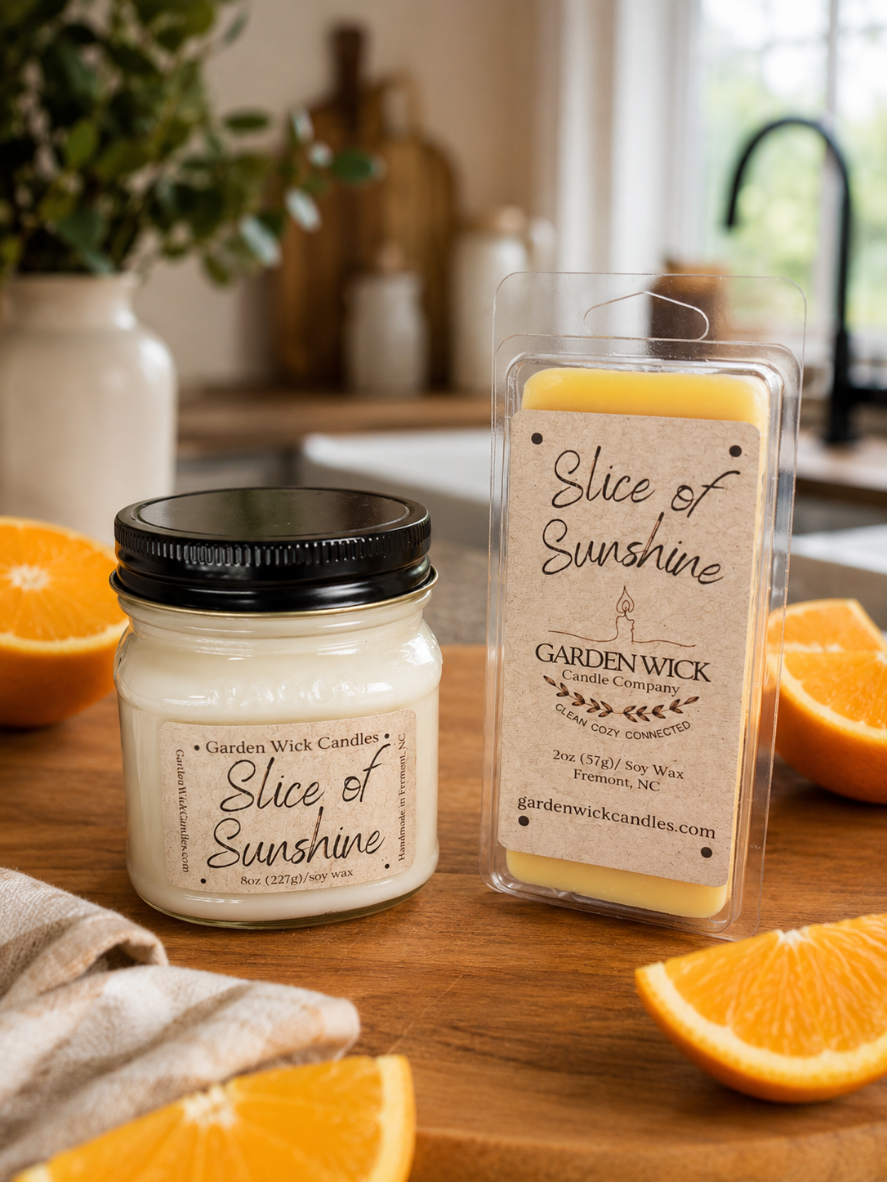 Slice of Sunshine handcrafted citrus candle with orange slice wax embed, filling spaces with bright, cheerful notes of grapefruit, mandarin, orange, and fresh lemon.