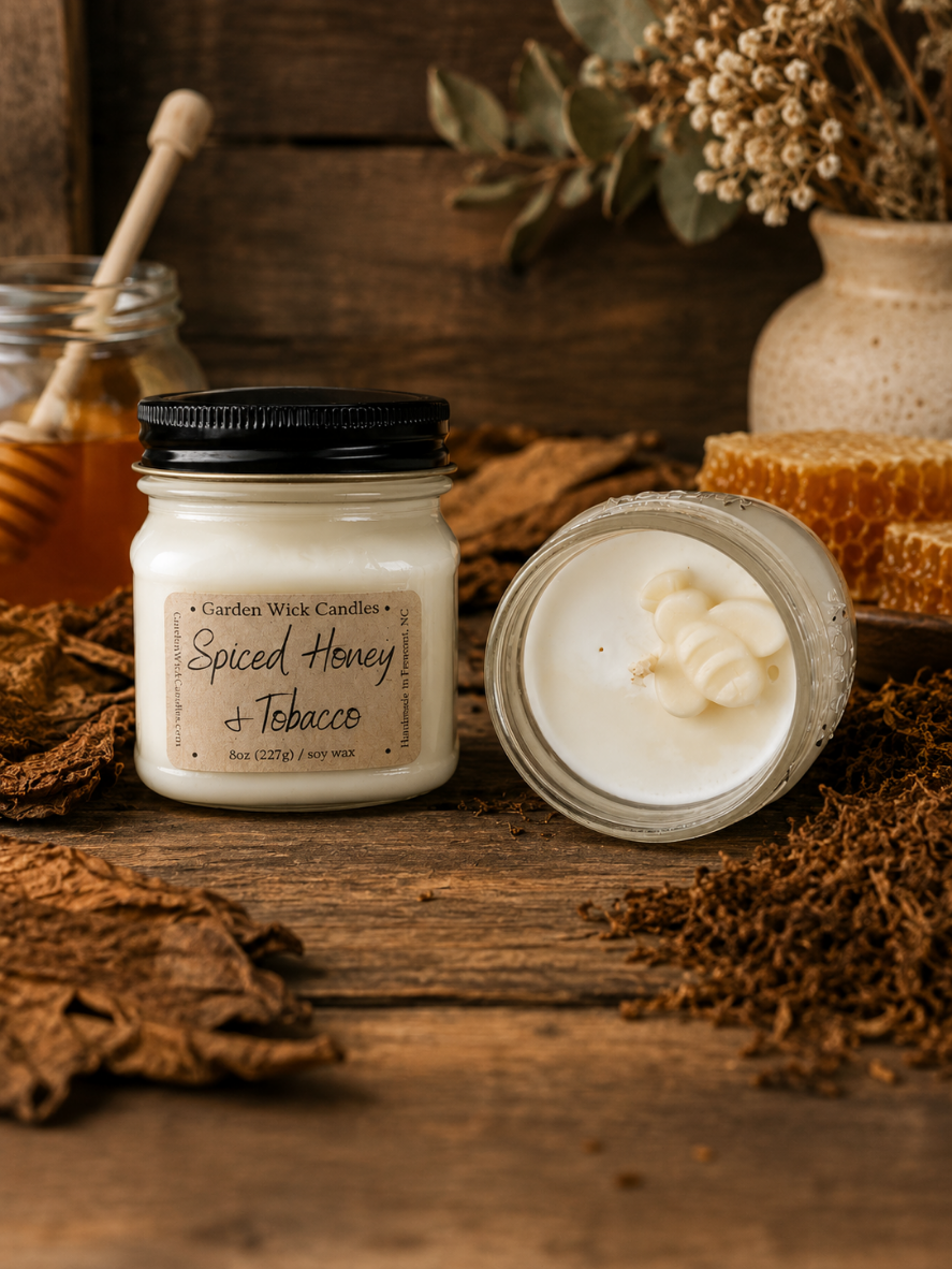 Spiced Honey & Tobacco mason jar candle with warm, spicy, and woody fragrance featuring bergamot, honey, amber, tobacco leaves, oud, tonka bean, and dark musk from Garden Wick
